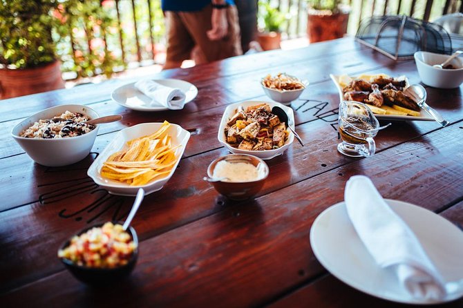 Nicole's Table - All about Jerk - Rum punch, fruit juice, and the veranda lunch