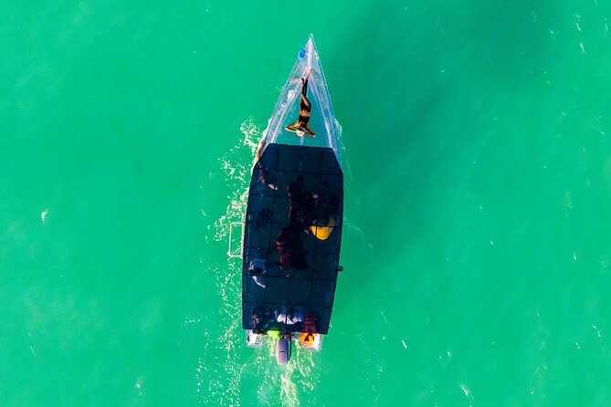 Reef Explorers Transparent Boat and Beach Tour - The Andes Ship Wreck adds depth to Deep Bay